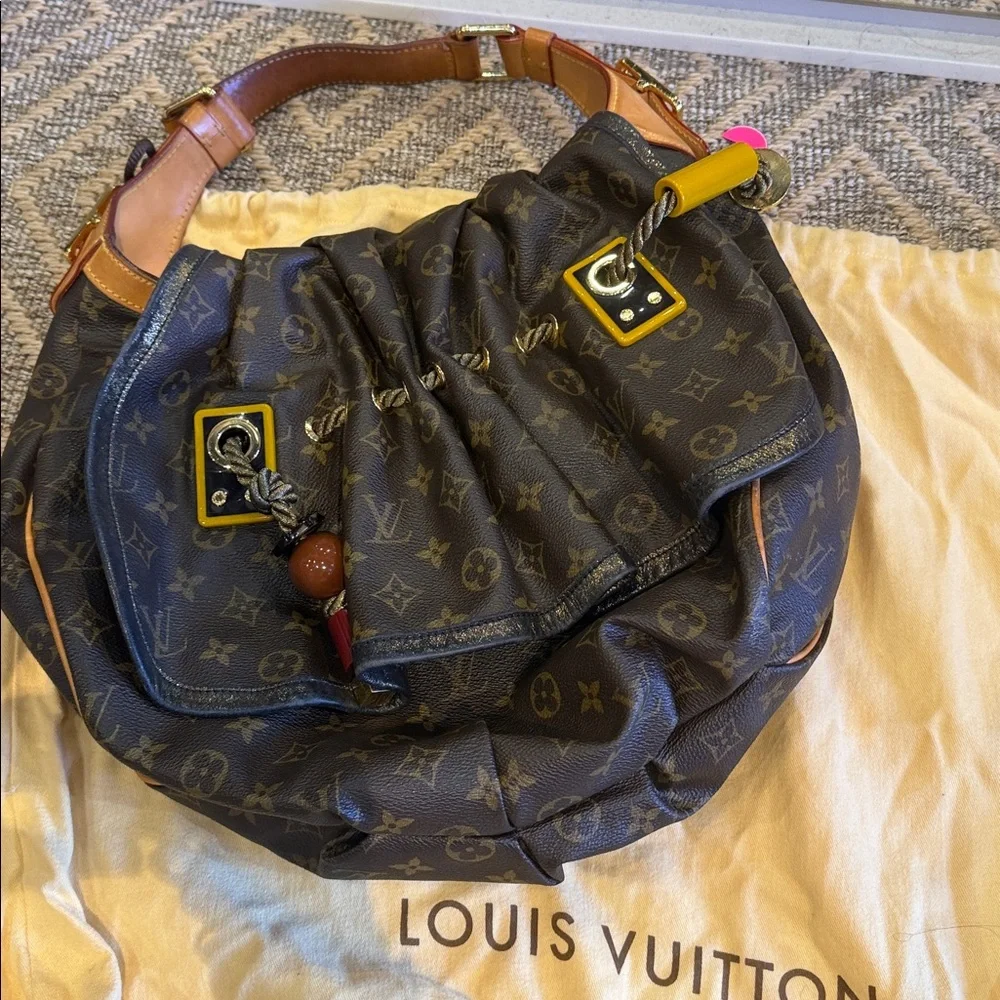 Louis Vuitton Brown Monogram Drawstring Shoulder Bag circa 2009